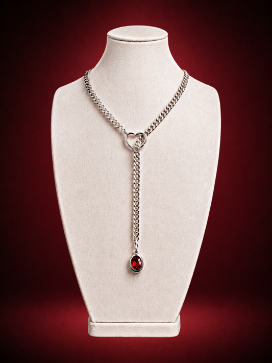 Silver lariat necklace with ruby solitaire pendant and heart-shaped clasp by Wildnightx