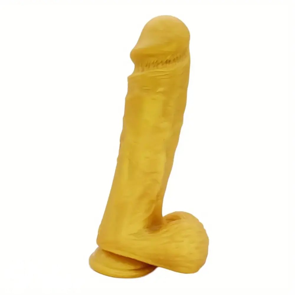 Yellow textured silicone dildo with a flared harness-compatible base