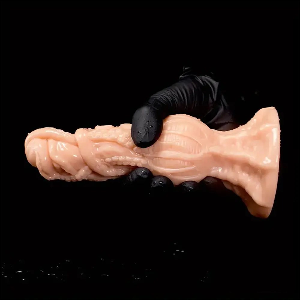 Flesh-tone fantasy dildo with swirled knot texture, photo 3