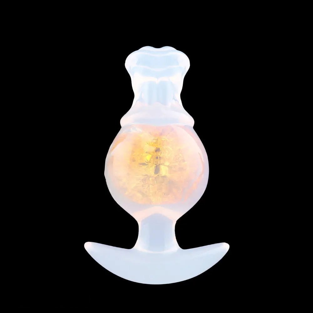 Yellow silicone anal plug with anchor base