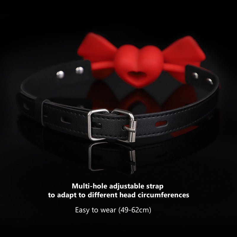 Red silicone bowknot ball gag with heart-shaped hollow design, photo 3