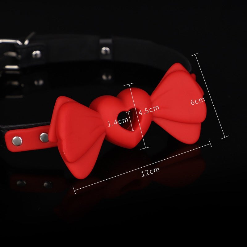 Red silicone bowknot ball gag with heart-shaped hollow design, photo 4