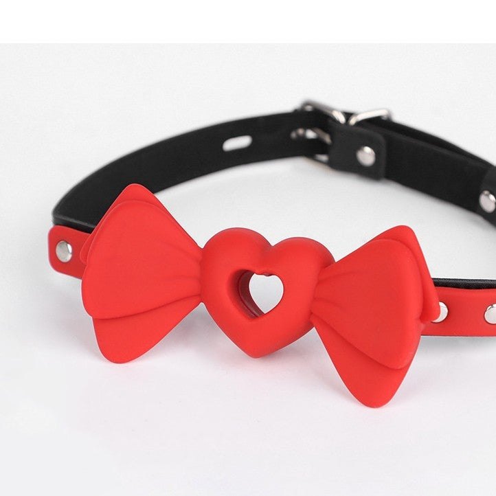 Red silicone bowknot ball gag with heart-shaped hollow design, photo 5
