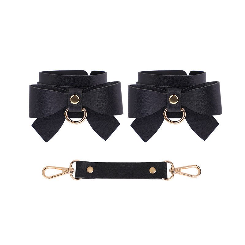 Red Bowknot PU leather bondage set with collar, whip, and cuffs