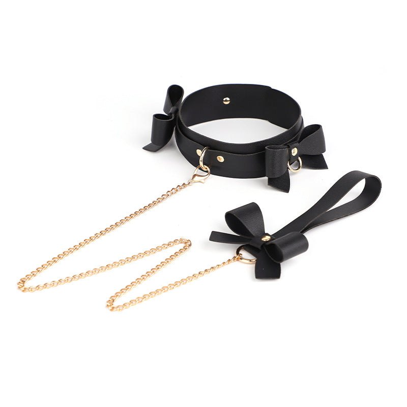 Red Bowknot PU leather bondage set with collar, whip, and cuffs
