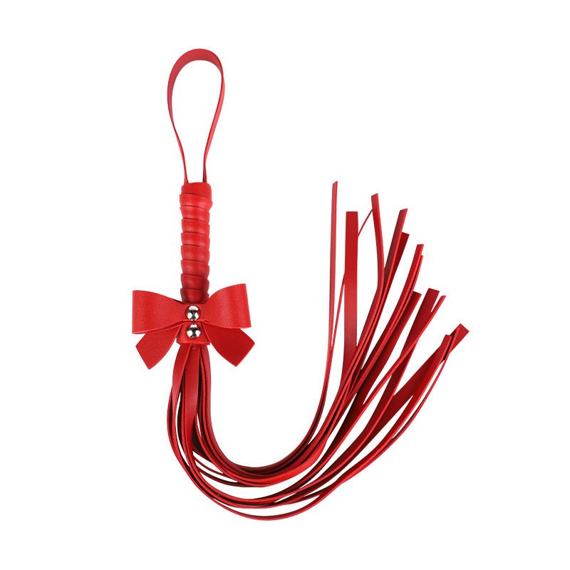 Bowknot PU leather bondage set with collar, whip, and cuffs, photo 2