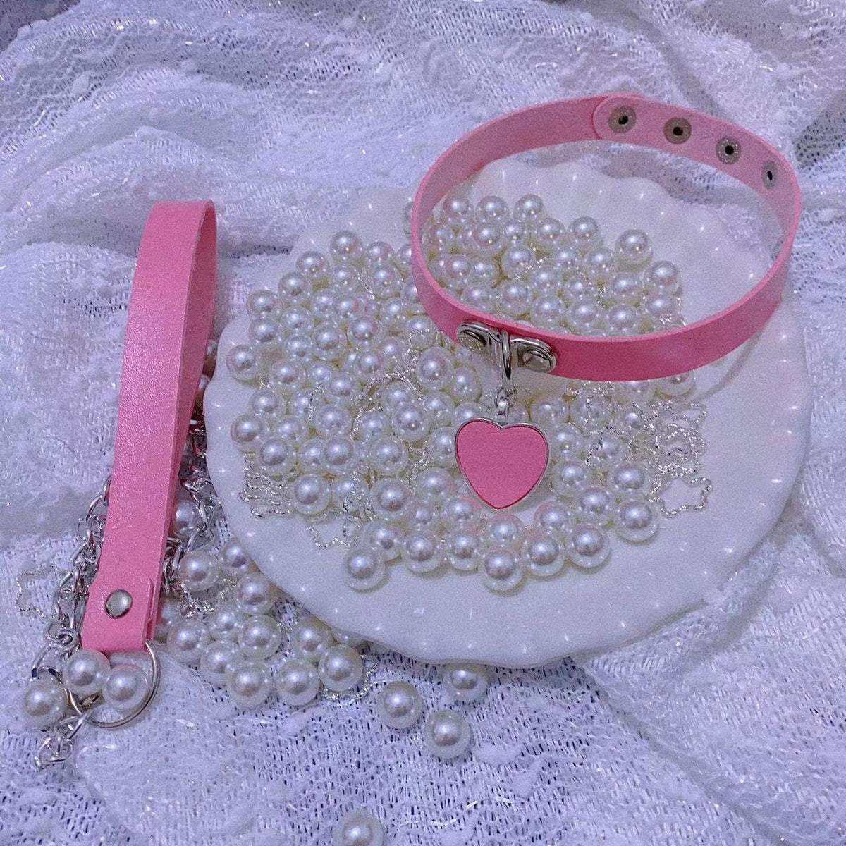 Pink chain collar hand leash accessory