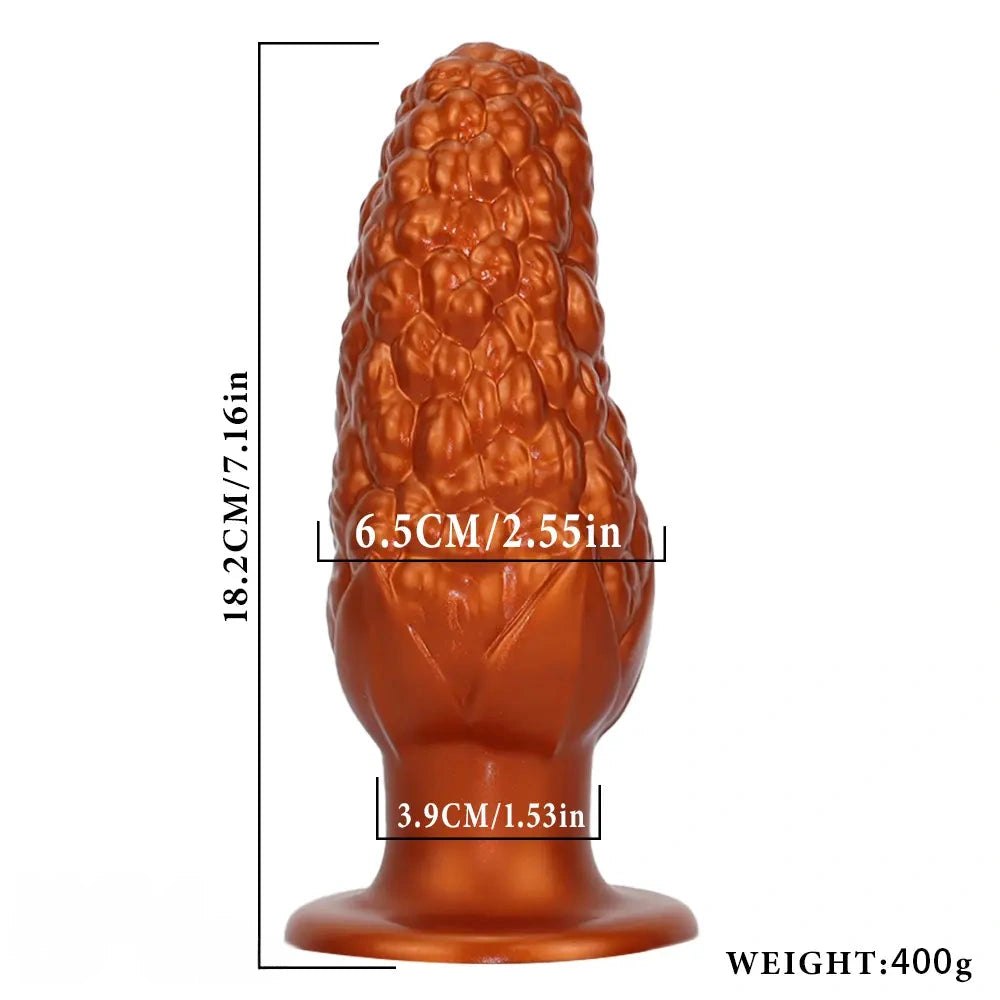 Gold corn textured silicone anal plug with flared base