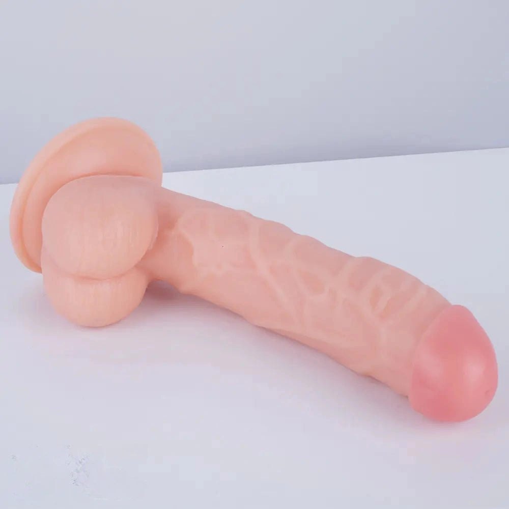 Flesh-tone curved realistic dildo with suction cup base, photo 2