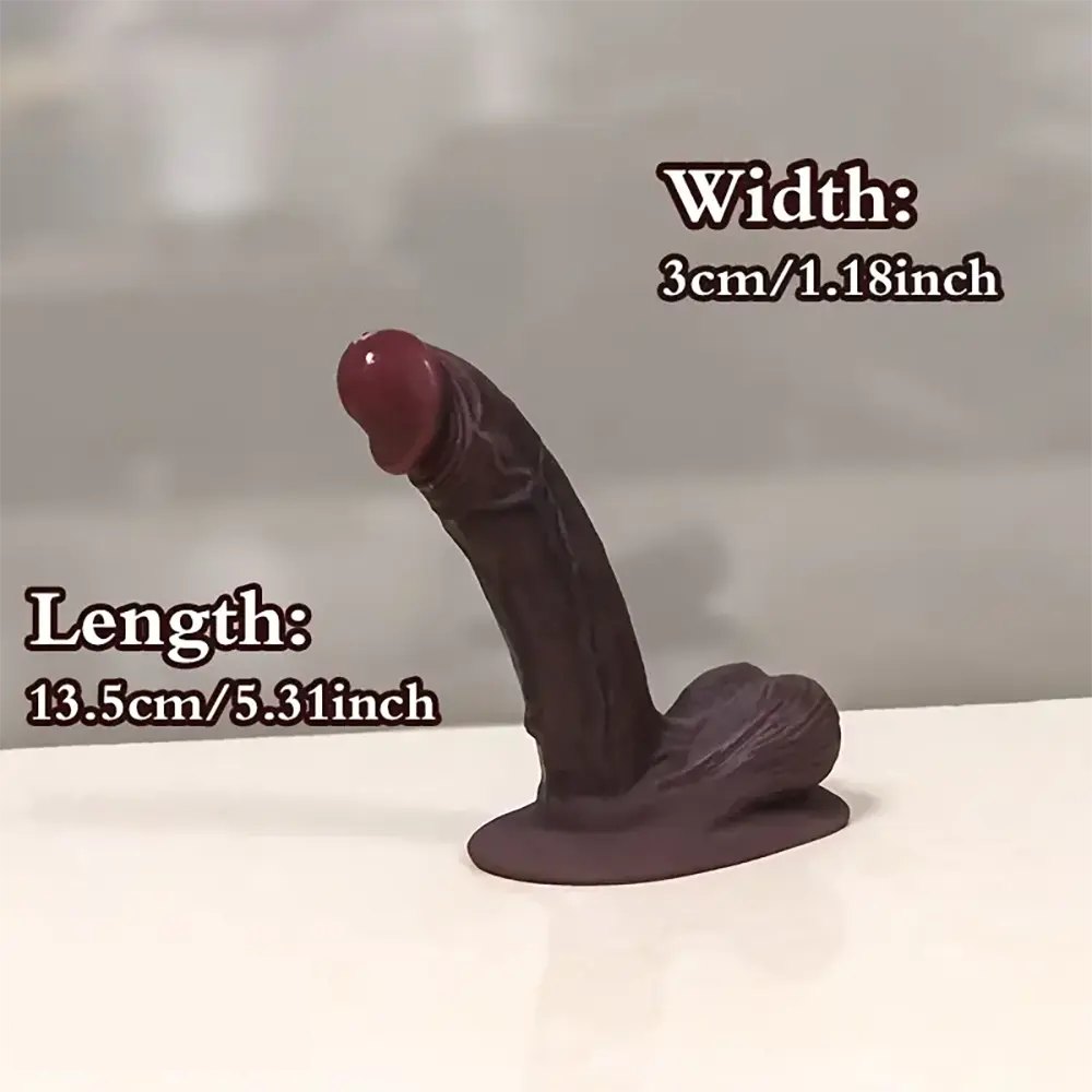 Ebony curved silicone g-spot dildo in flesh or ebony