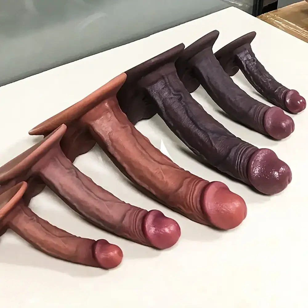 Curved silicone g-spot dildo in flesh or ebony, photo 1