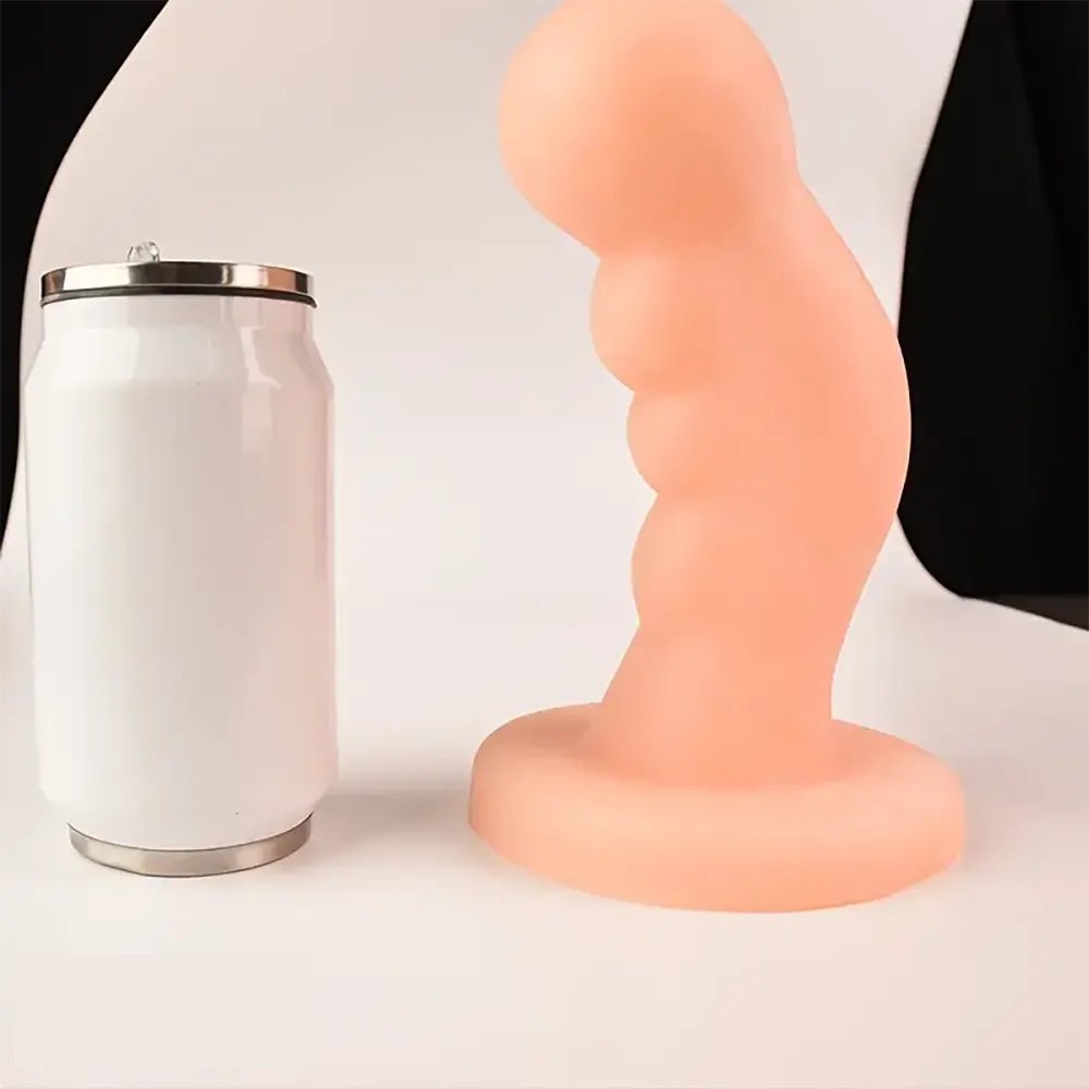 Brown curved brown PVC anal dildo