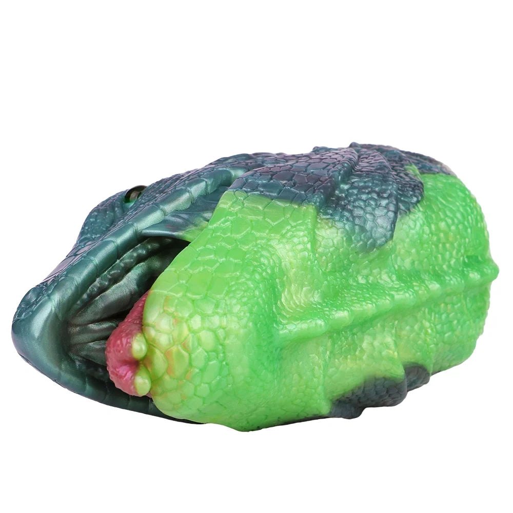 Teal-grey lizard head masturbator with emerald green eye, photo 7
