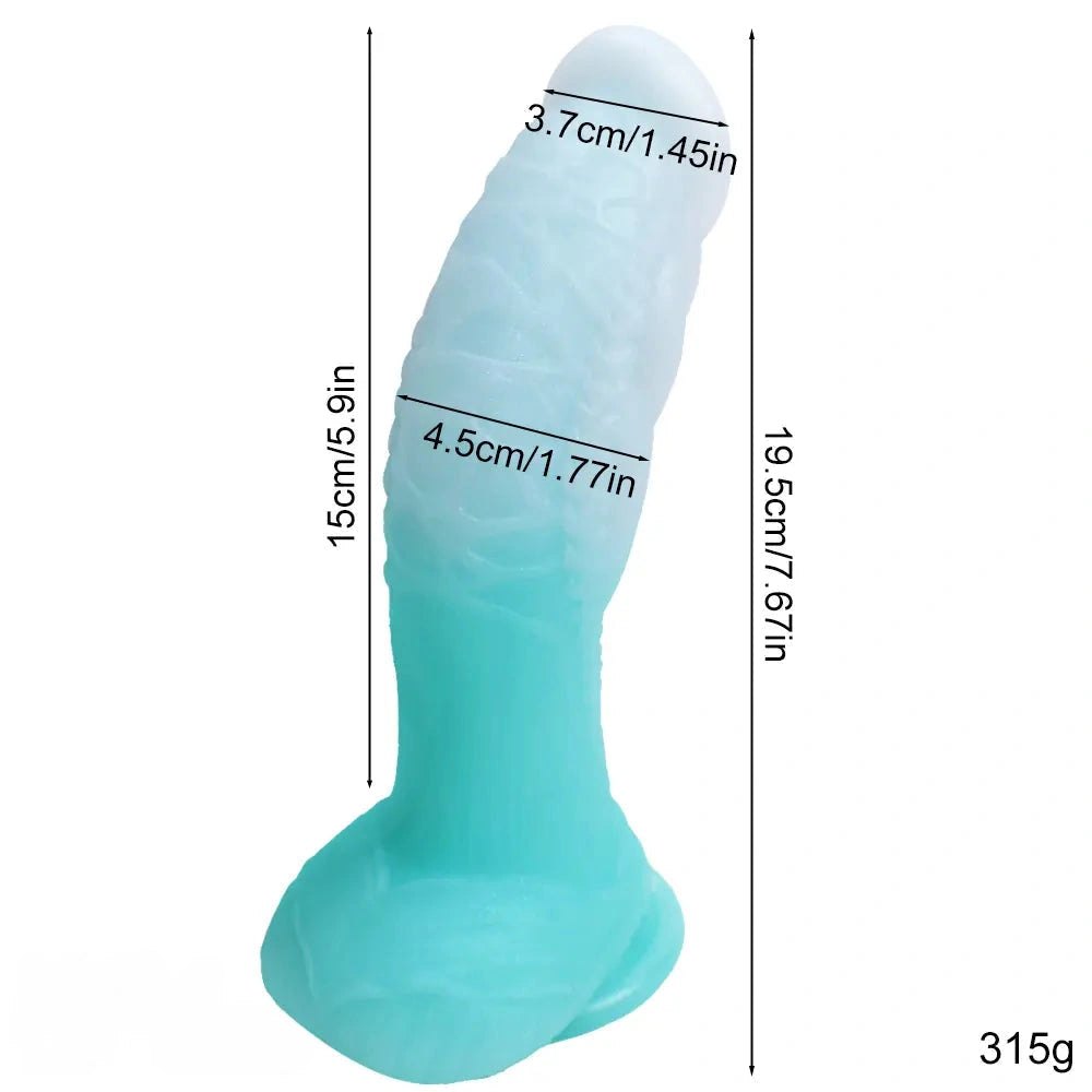 A ridged silicone dragon dildo that glows in the dark