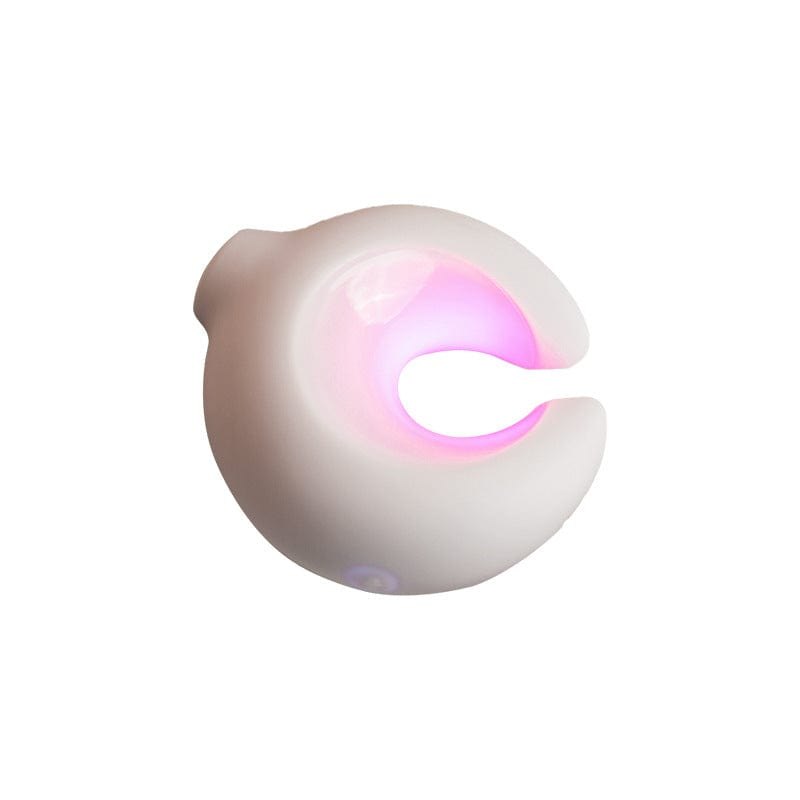 White glowing clitoral suction vibrator, photo 1