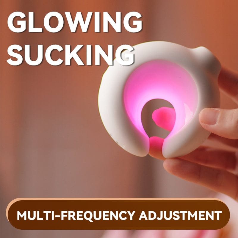 White glowing clitoral suction vibrator, photo 2