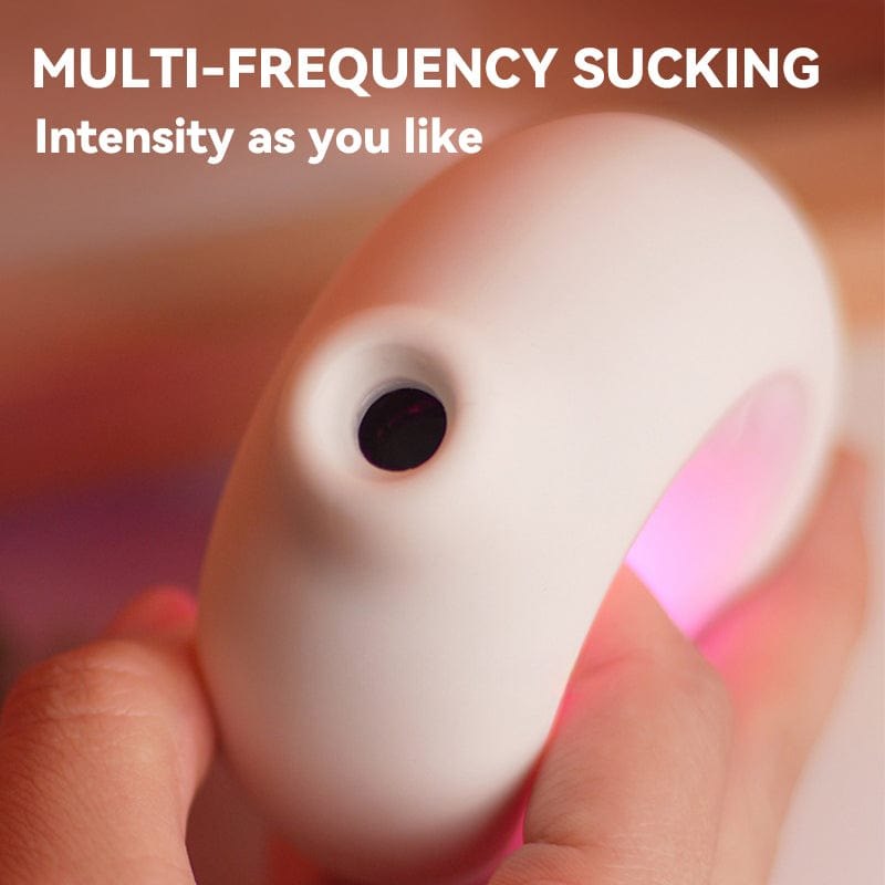 White glowing clitoral suction vibrator, photo 3