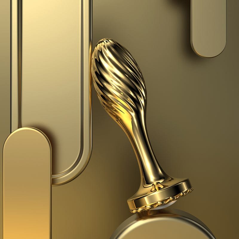 Gold-toned stainless steel anal plug with spiral texture, photo 2
