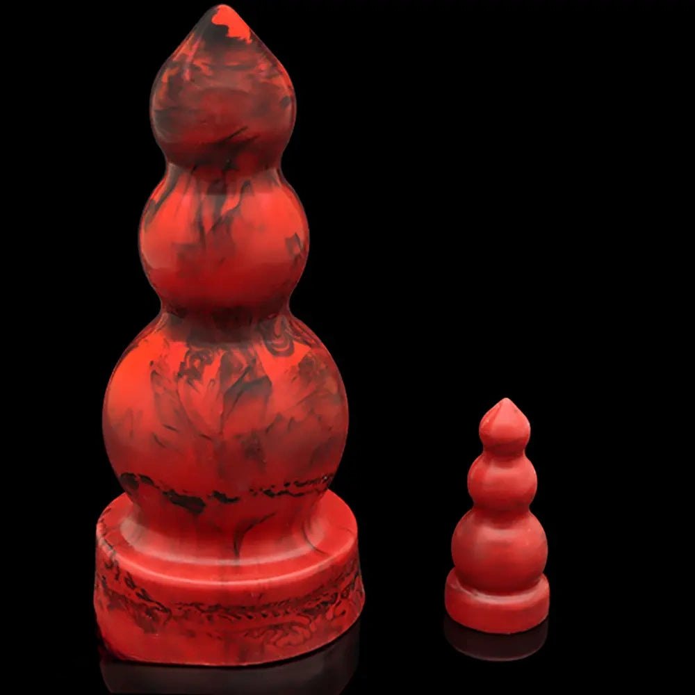 Red graduated silicone butt plug, photo 1