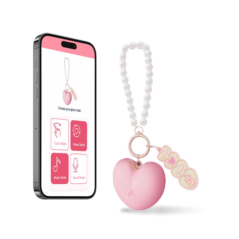 Pink heart pendant vibrator on pearl chain, photo 1