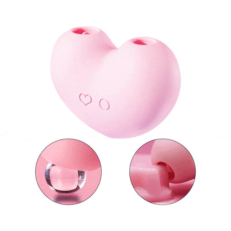 Pink heart-shaped clitoral suction vibrator, photo 1