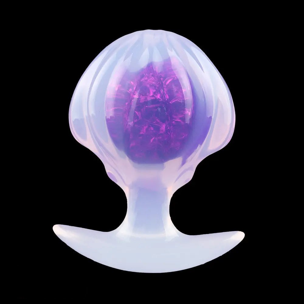 Purple jeweled silicone butt plug with flared base