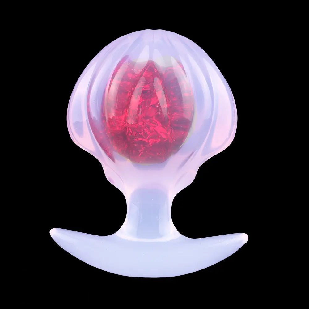 Red jeweled silicone butt plug with flared base