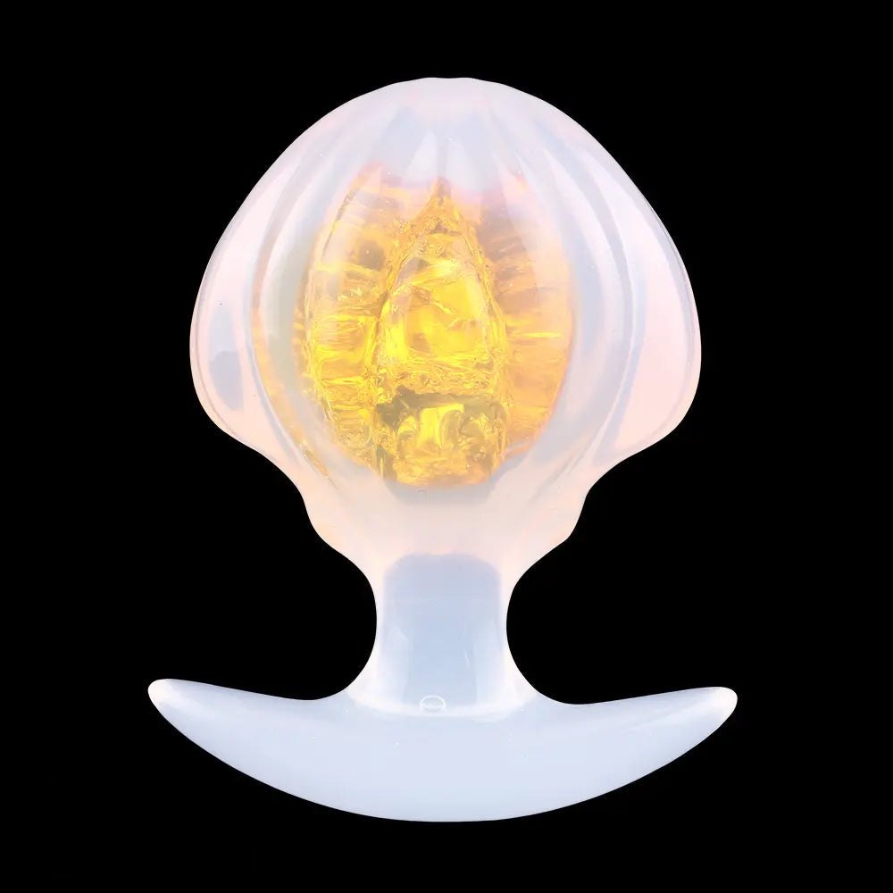 Yellow jeweled silicone butt plug with flared base