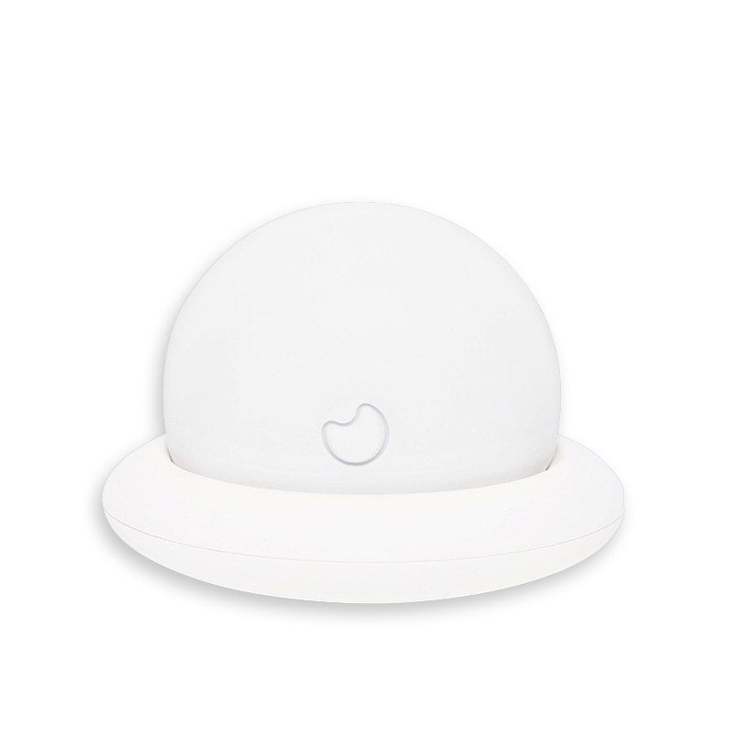 White compact dome-shaped clitoral suction vibrator