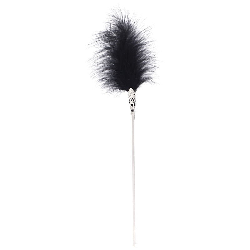 Black feather tickler with gold metal handle, photo 7