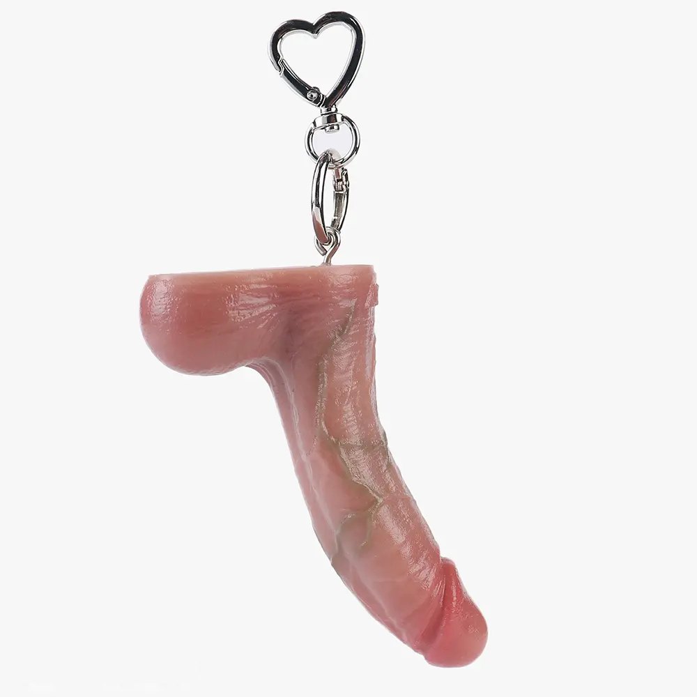 Flesh-tone mini silicone dildo keychain, photo 1