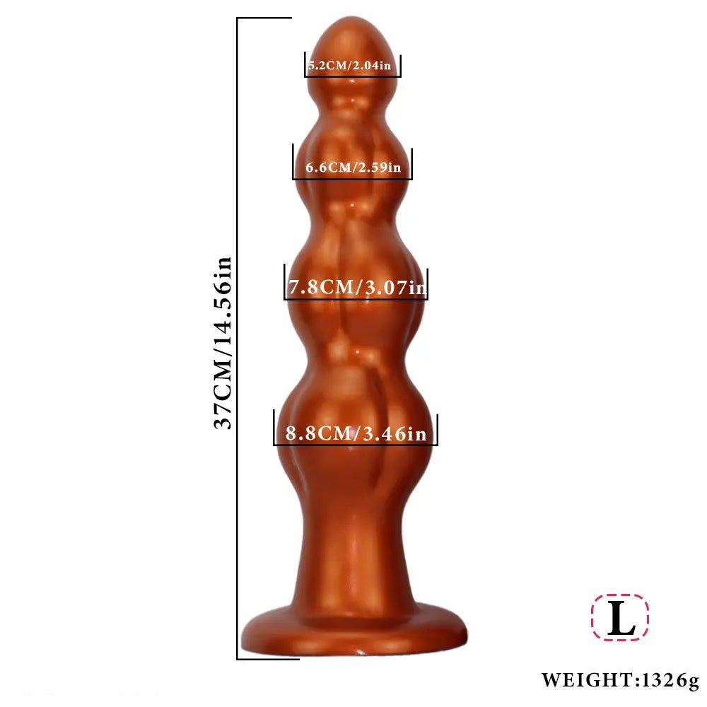 Gold metallic gold graduated muscle shaped anal plug