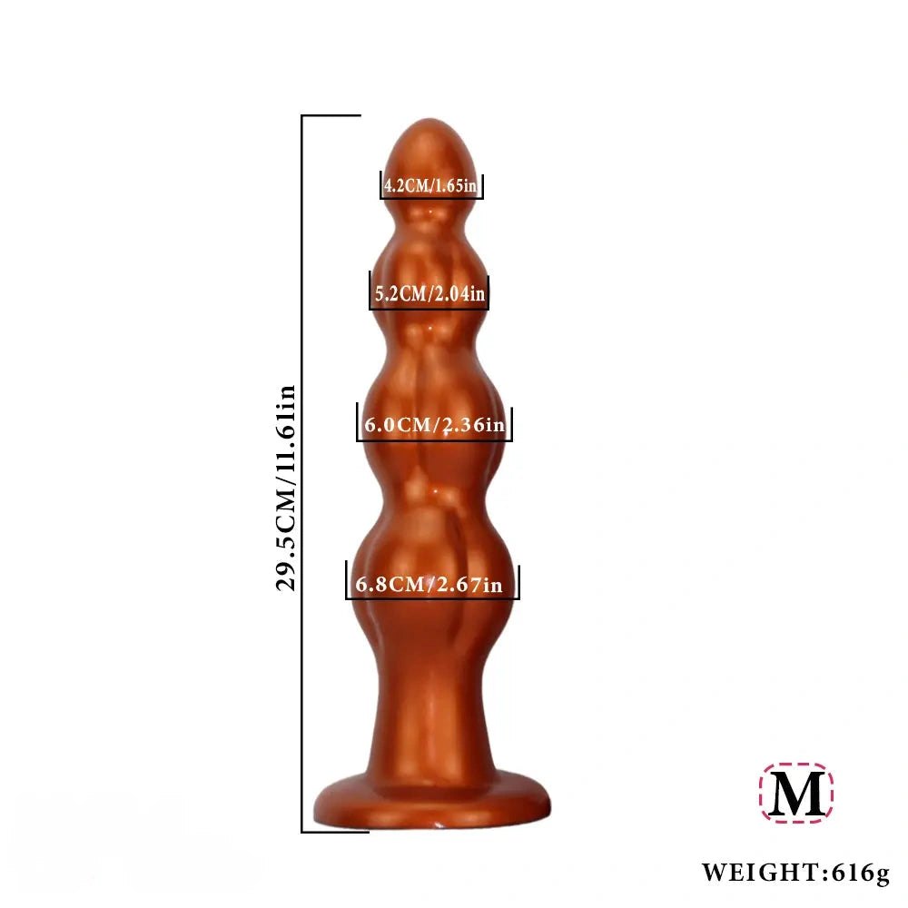 Gold metallic gold graduated muscle shaped anal plug