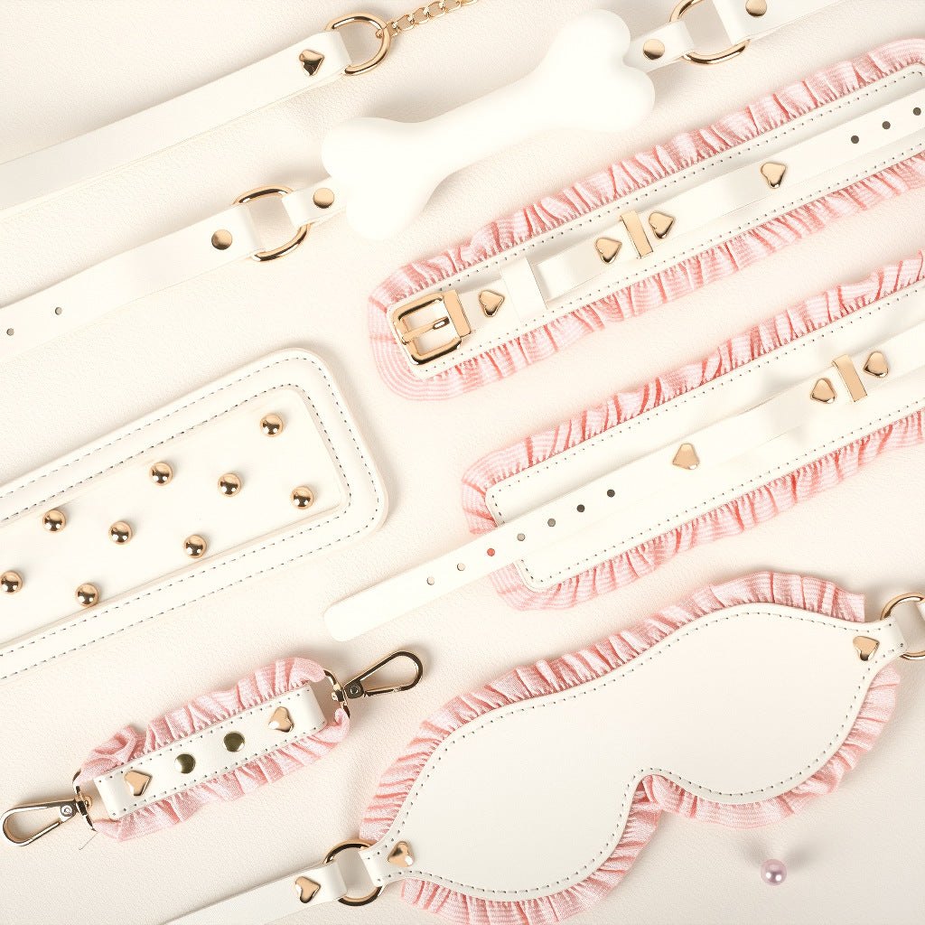 Pink and white 6-piece bondage set with blindfold, cuffs, collar, and paddle, photo 2