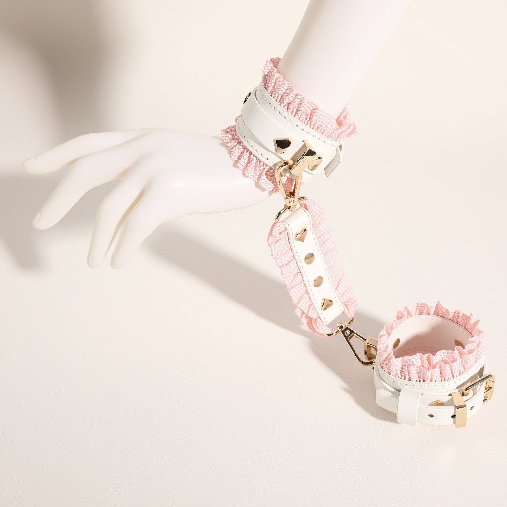 Pink and white 6-piece bondage set with blindfold, cuffs, collar, and paddle, photo 9