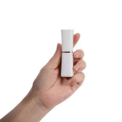 White lipstick-style bullet vibrator with interchangeable heads