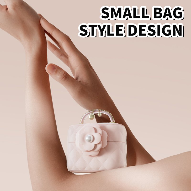 Pink purse shaped suction vibrator with egg, photo 2