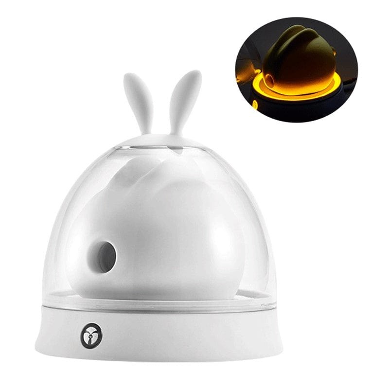 White rabbit clitoral suction vibrator on light-up charging base, photo 1