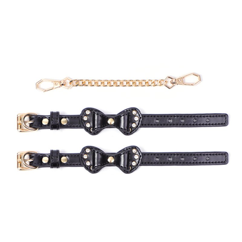 Bow-shaped PU leather handcuffs with rhinestone accents and metal chain, photo 4