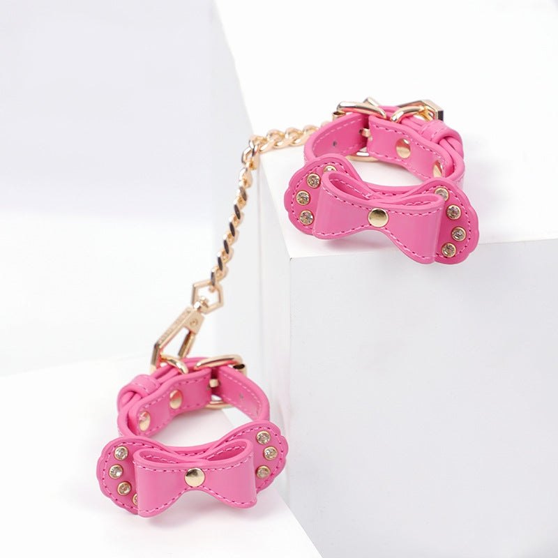 Bow-shaped PU leather handcuffs with rhinestone accents and metal chain, photo 5