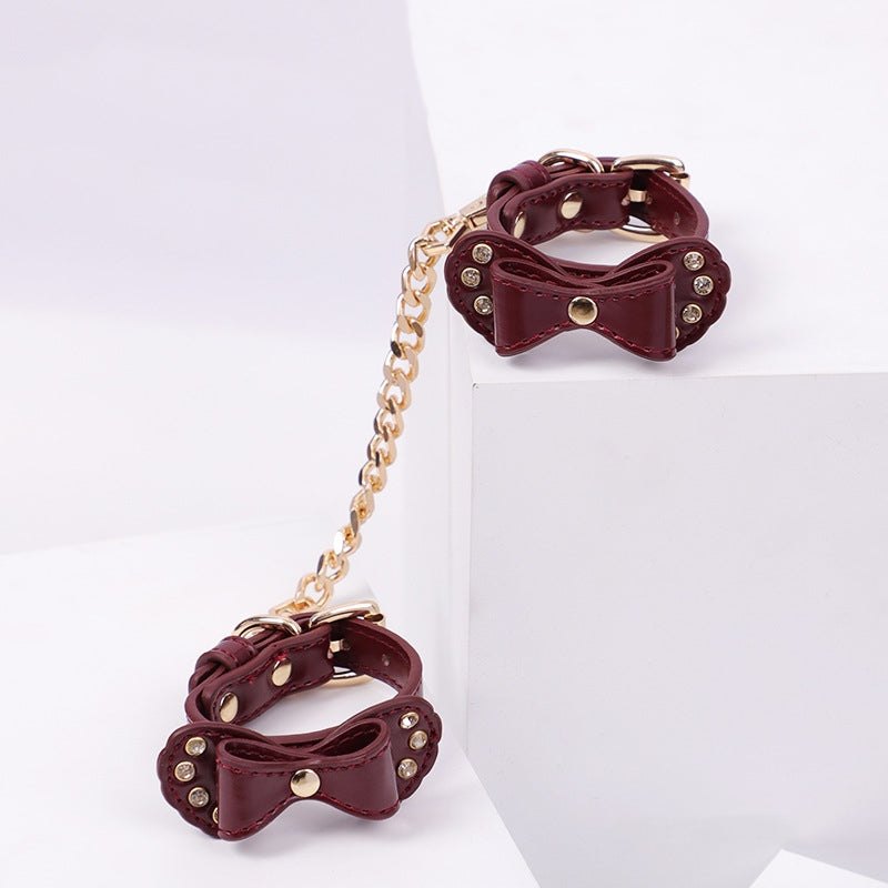 Bow-shaped PU leather handcuffs with rhinestone accents and metal chain, photo 6