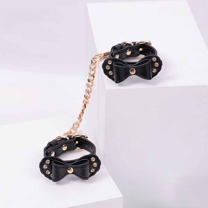 Bow-shaped PU leather handcuffs with rhinestone accents and metal chain, photo 7