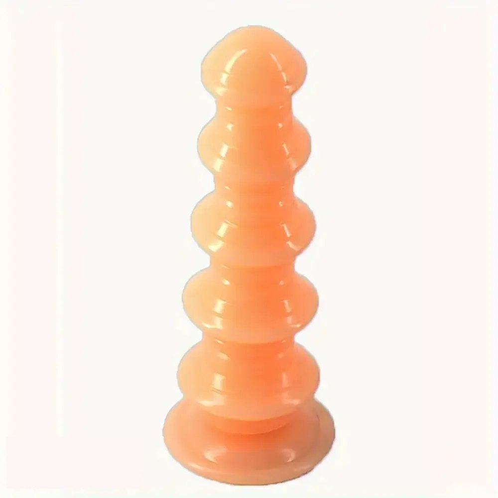 Brown ribbed graduated PVC anal dildo