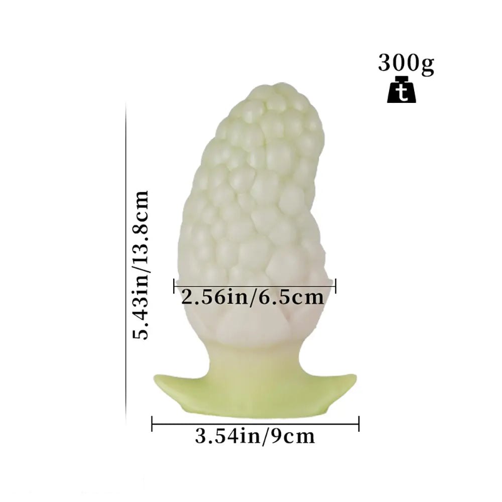 Green strawberry textured silicone butt plug