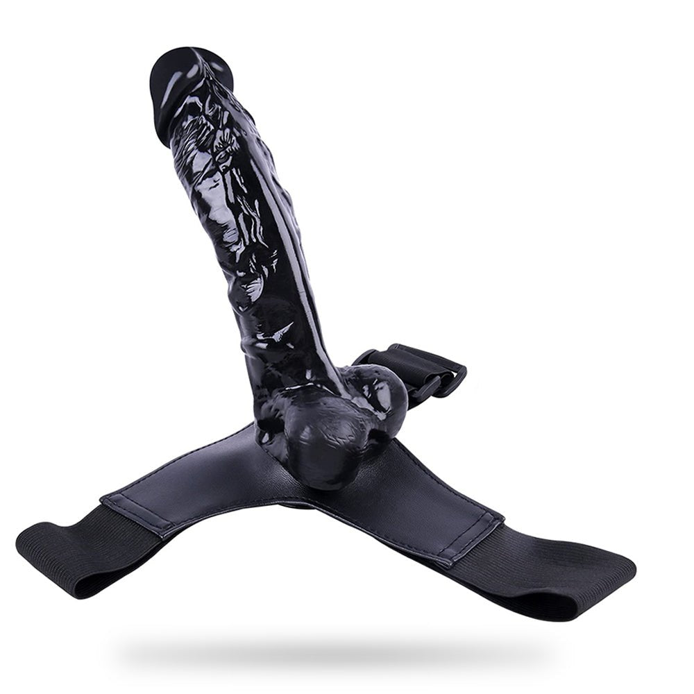 Black silicone strap-on dildo with harness