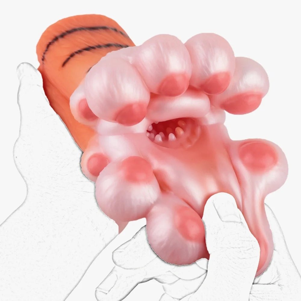 Amber orange tiger paw masturbator with pink pearlescent pads, photo 4