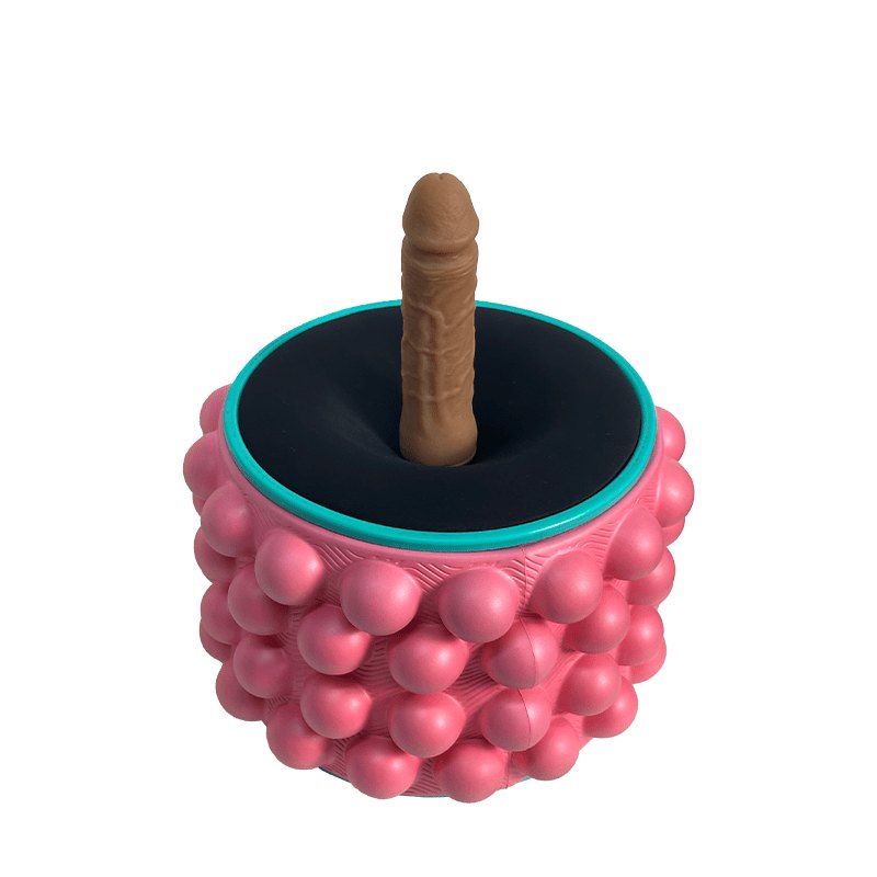 Pink textured vibrating yoga wheel with center attachment