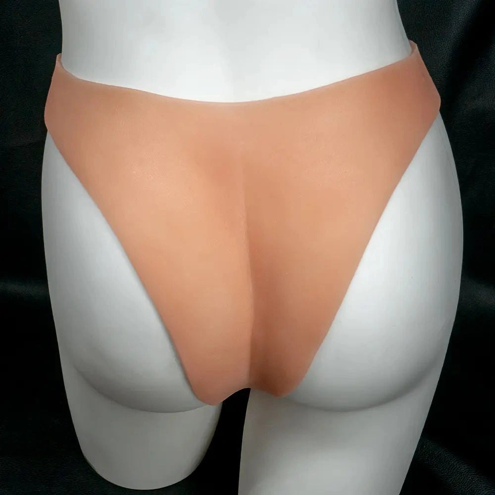Flesh-toned silicone strap-on dildo with wing straps, photo 13