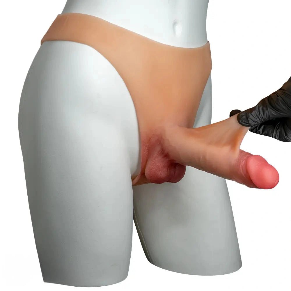 Flesh-toned silicone strap-on dildo with wing straps, photo 3