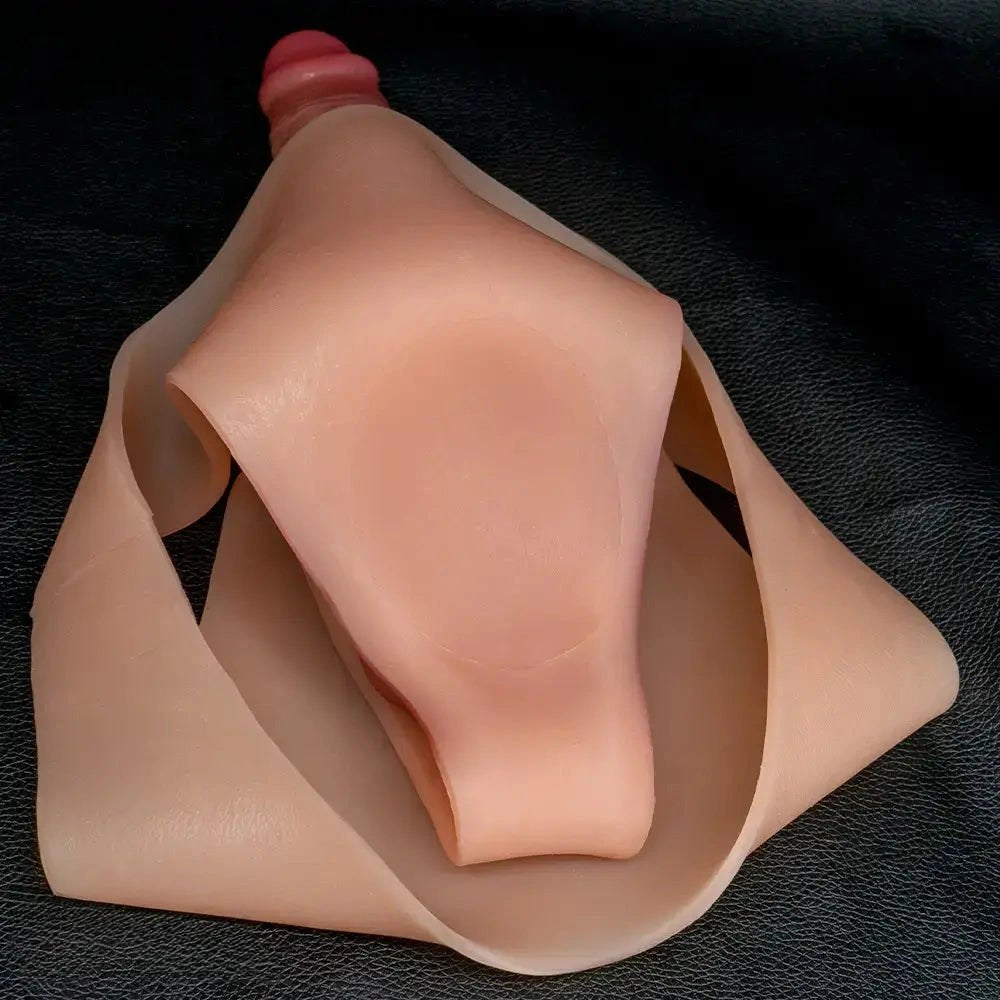 Flesh-toned silicone strap-on dildo with wing straps, photo 5